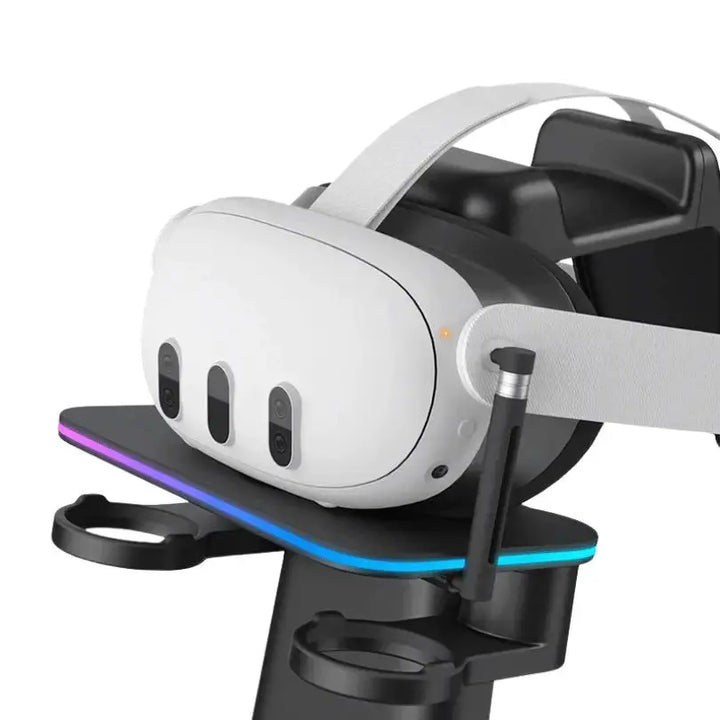 The KIWI design RGB Vertical Charging Stand neatly organizing a Meta Quest headset and its two controllers.