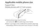 Black smartphone VR headset with adjustable straps beside wireless gamepad for 3D viewing | MetaNexusXR