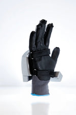 MetaNexusXR: User wearing SenseGlove Nova haptic gloves and bHaptics vest, experiencing immersive XR. | MetaNexusXR