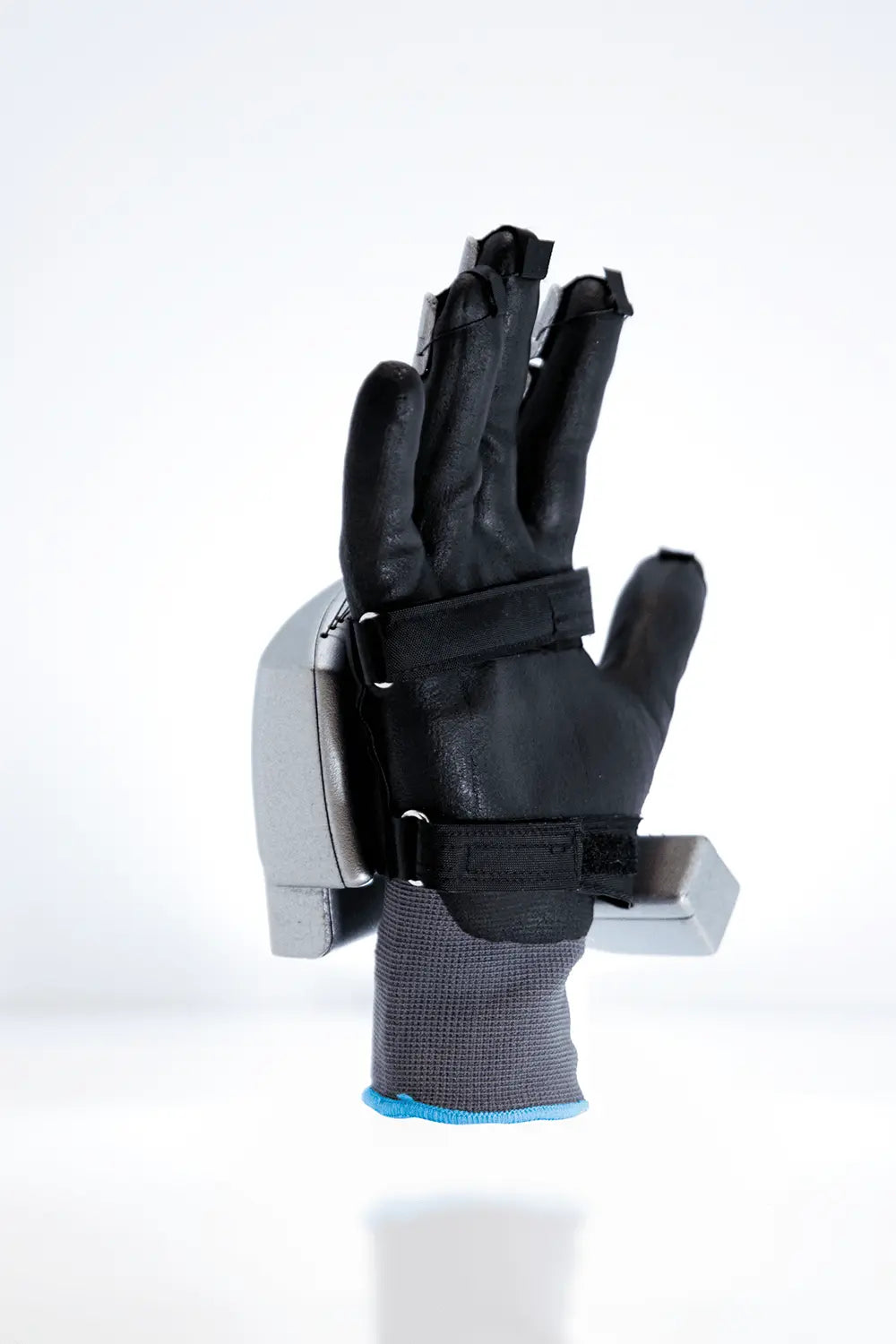 MetaNexusXR: User wearing SenseGlove Nova haptic gloves and bHaptics vest, experiencing immersive XR. | MetaNexusXR