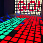 MetaNexusXR activated LED dance grid floor tiles with bright touch-sensitive light patterns for interactive games. | MetaNexusXR