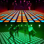 MetaNexusXR: Activated LED dance floor grid with colorful, interactive tiles for touch games. | MetaNexusXR