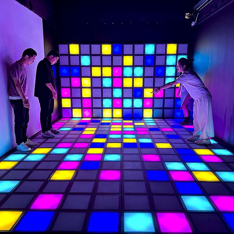 MetaNexusXR's vibrant LED dance grid floor, activated with bright tiles for interactive touch games. | MetaNexusXR